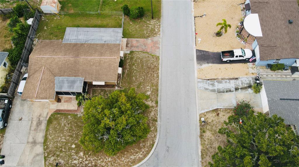 4935 Guardian Avenue Holiday, FL 34690 - Photo 32 of 32 an aerial view of a residential houses with outdoor space