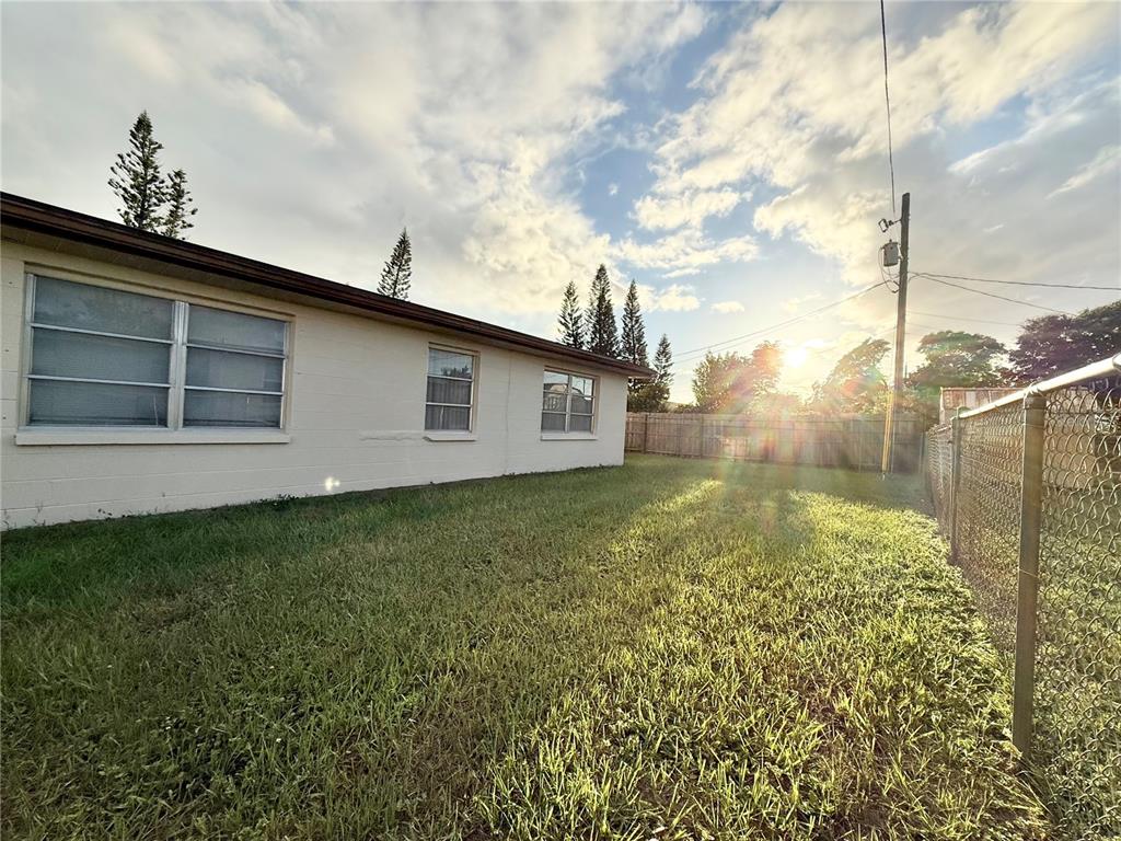 4935 Guardian Avenue Holiday, FL 34690 - Photo 9 of 32 a view of a backyard