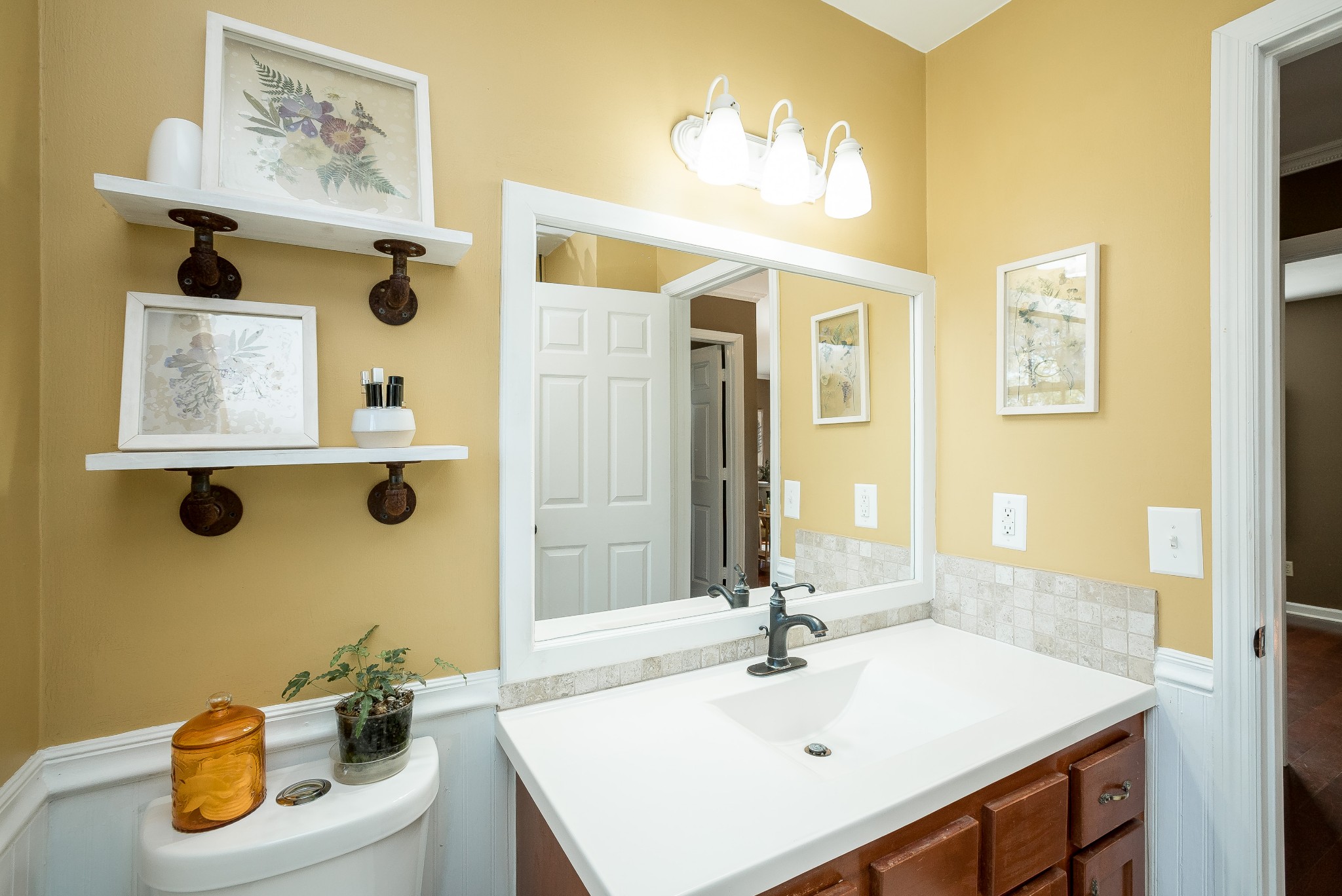 1715 South Walker Road Pleasant View, TN 37146 - Photo 20 of 42 a bathroom with a sink a mirror and a shower