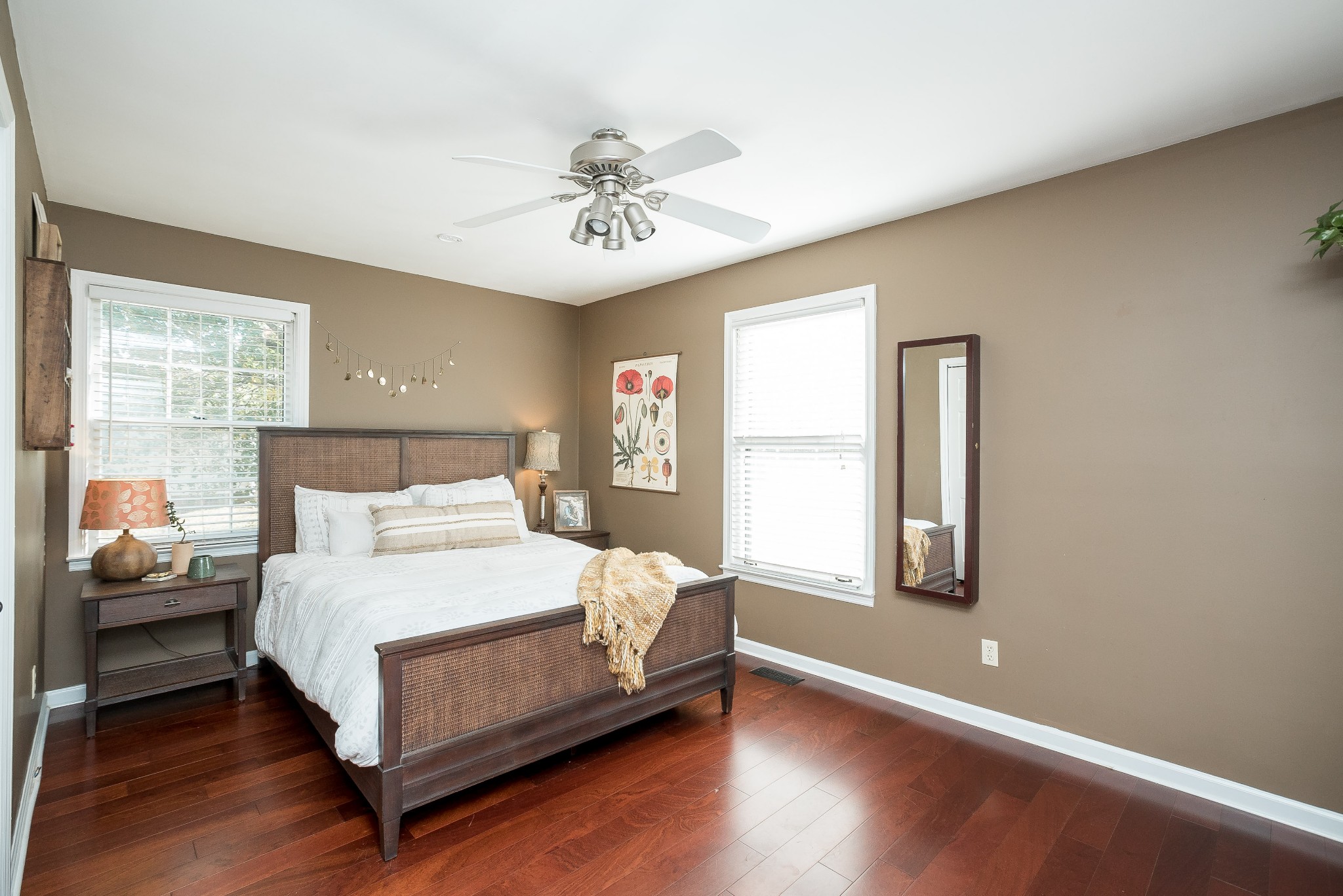 1715 South Walker Road Pleasant View, TN 37146 - Photo 24 of 42 a bedroom with a bed chandelier and a window
