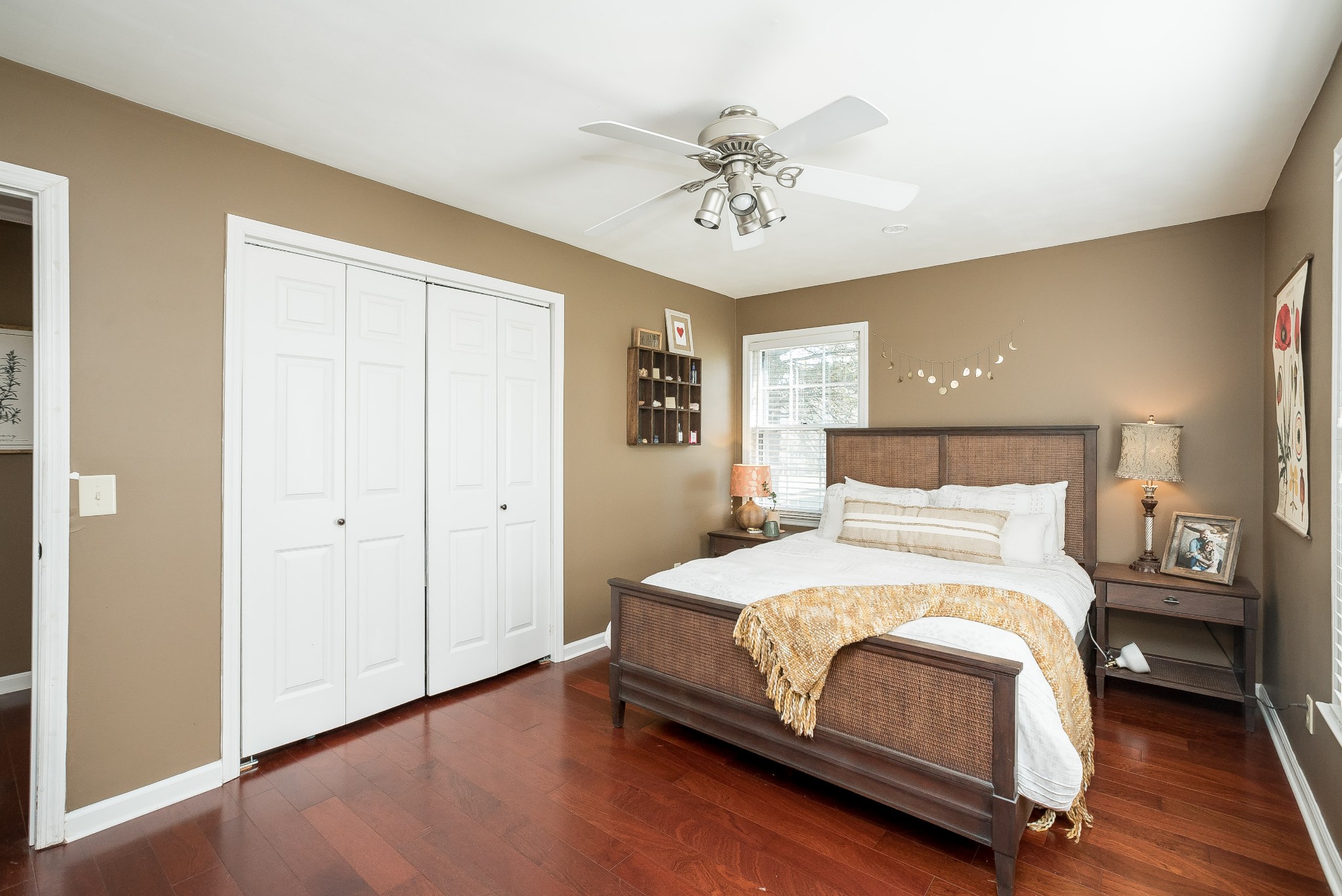 1715 South Walker Road Pleasant View, TN 37146 - Photo 25 of 42 a bedroom with a bed and a chandelier