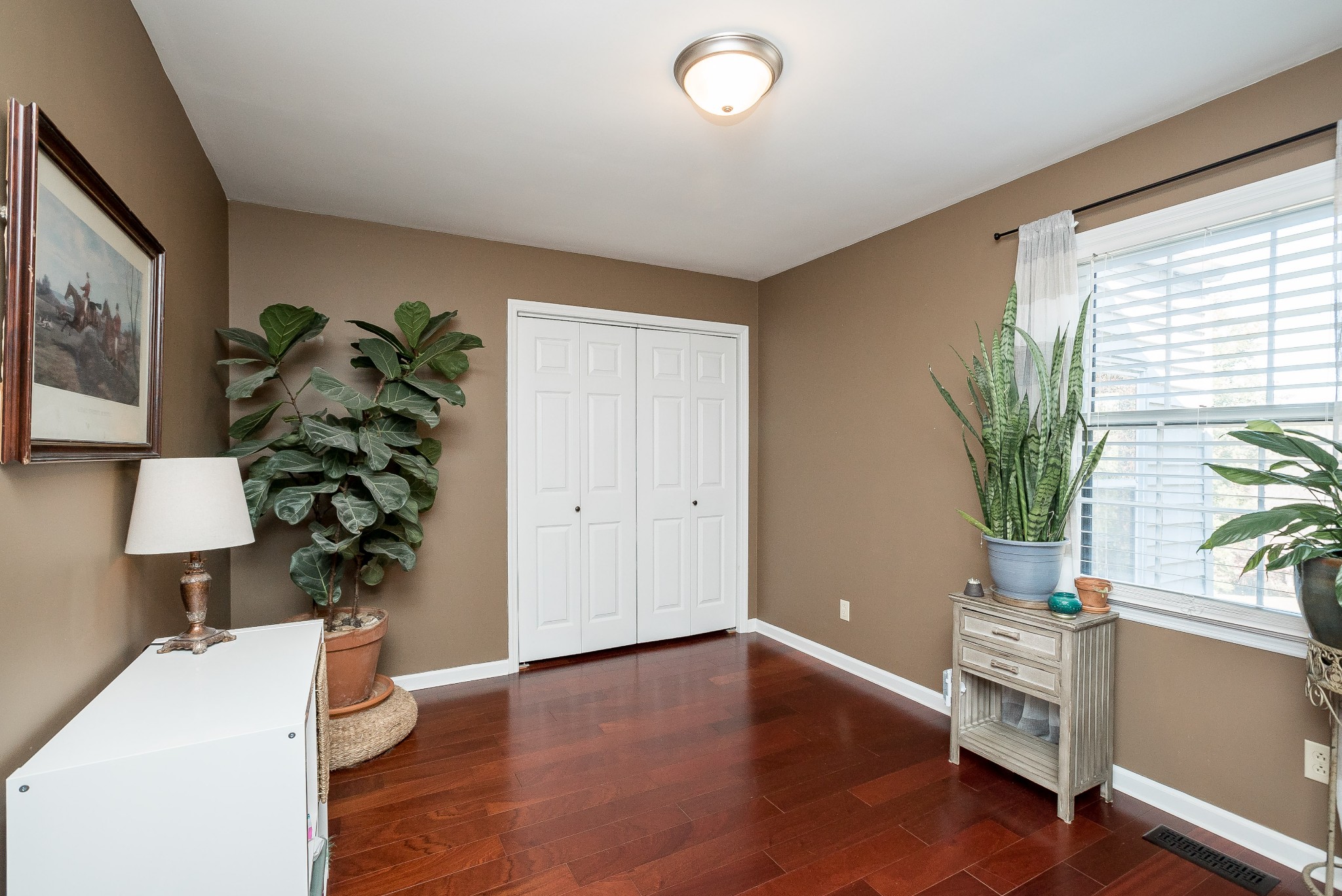 1715 South Walker Road Pleasant View, TN 37146 - Photo 28 of 42 a living room with furniture and a potted plant
