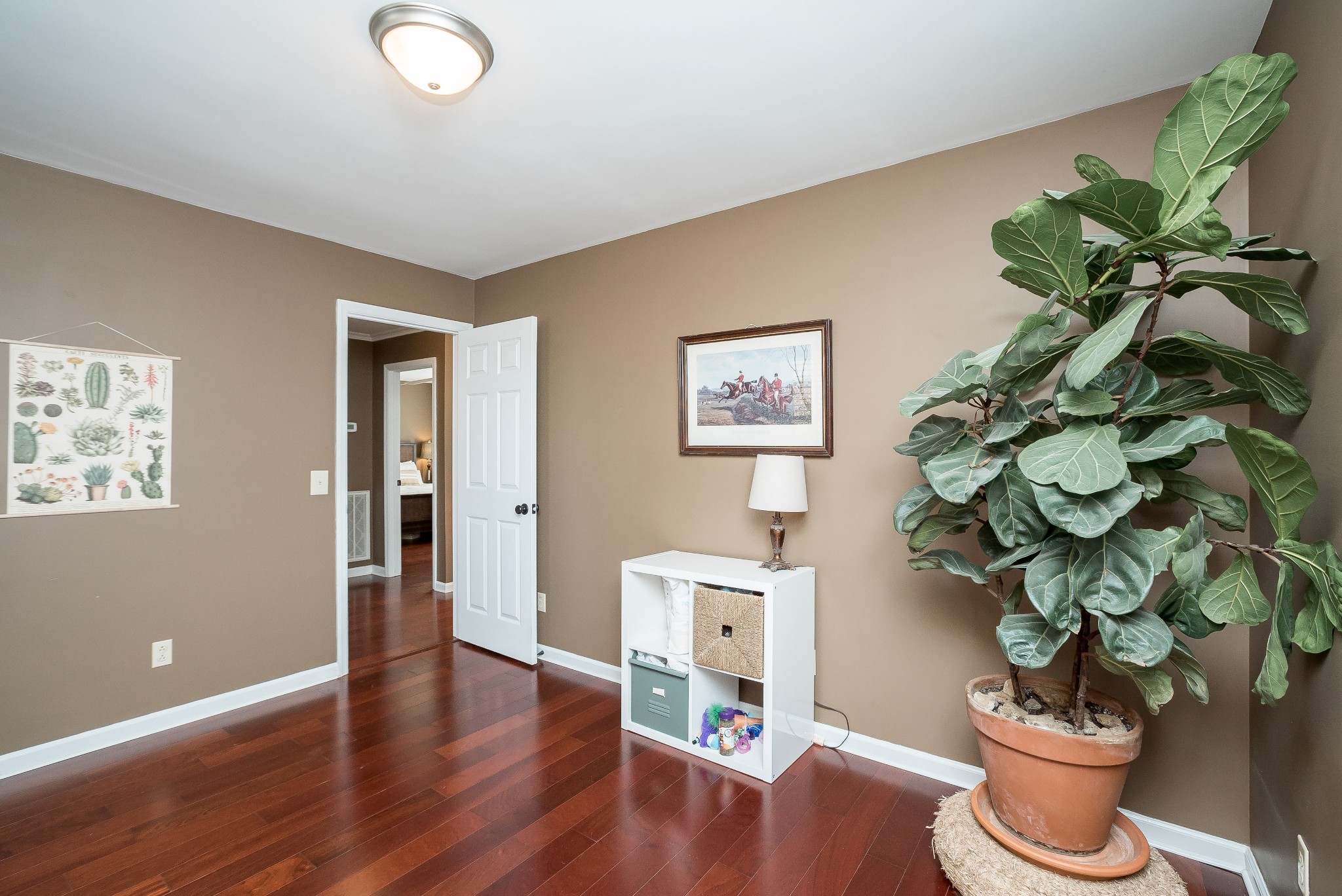1715 South Walker Road Pleasant View, TN 37146 - Photo 30 of 42 a view of living room filled with furniture and a potted plant