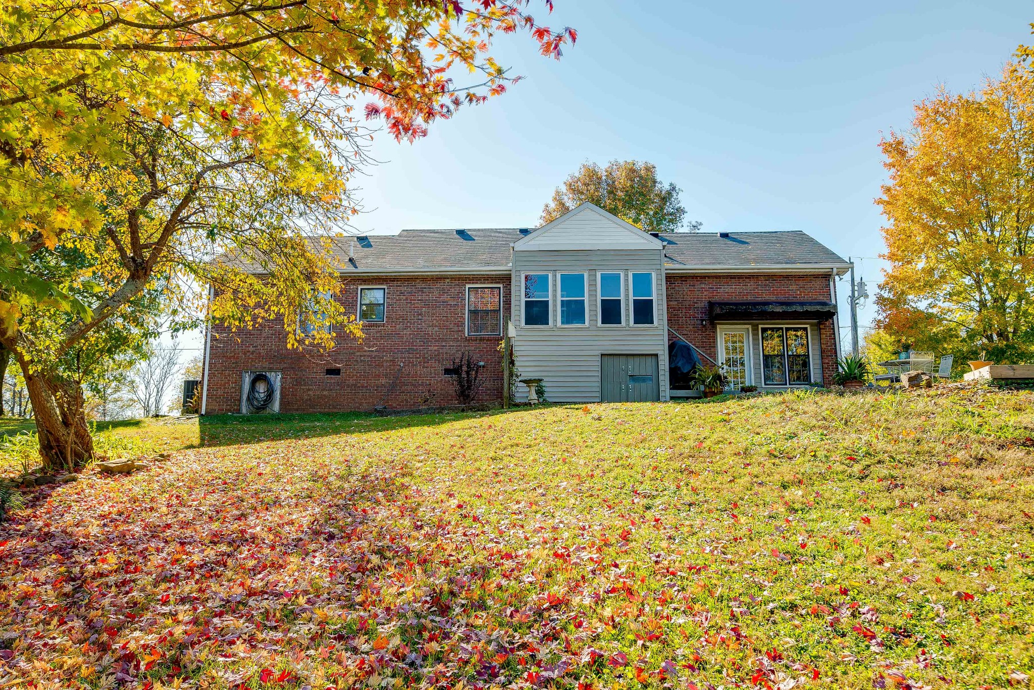 1715 South Walker Road Pleasant View, TN 37146 - Photo 34 of 42 a front view of a house with a yard and garage