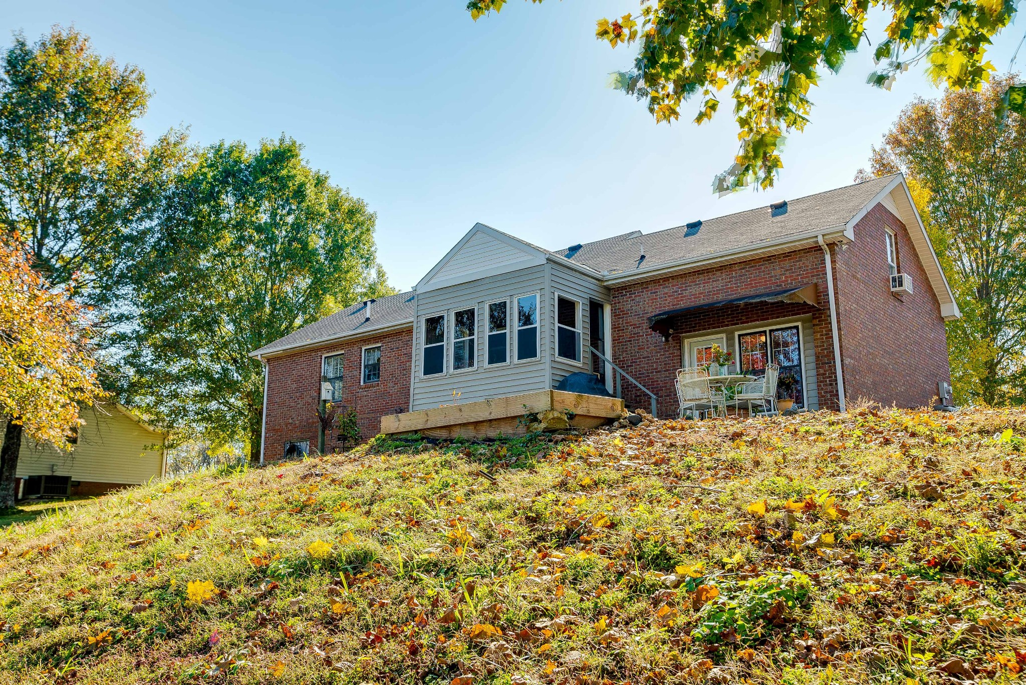 1715 South Walker Road Pleasant View, TN 37146 - Photo 35 of 42 a front view of a house with a yard