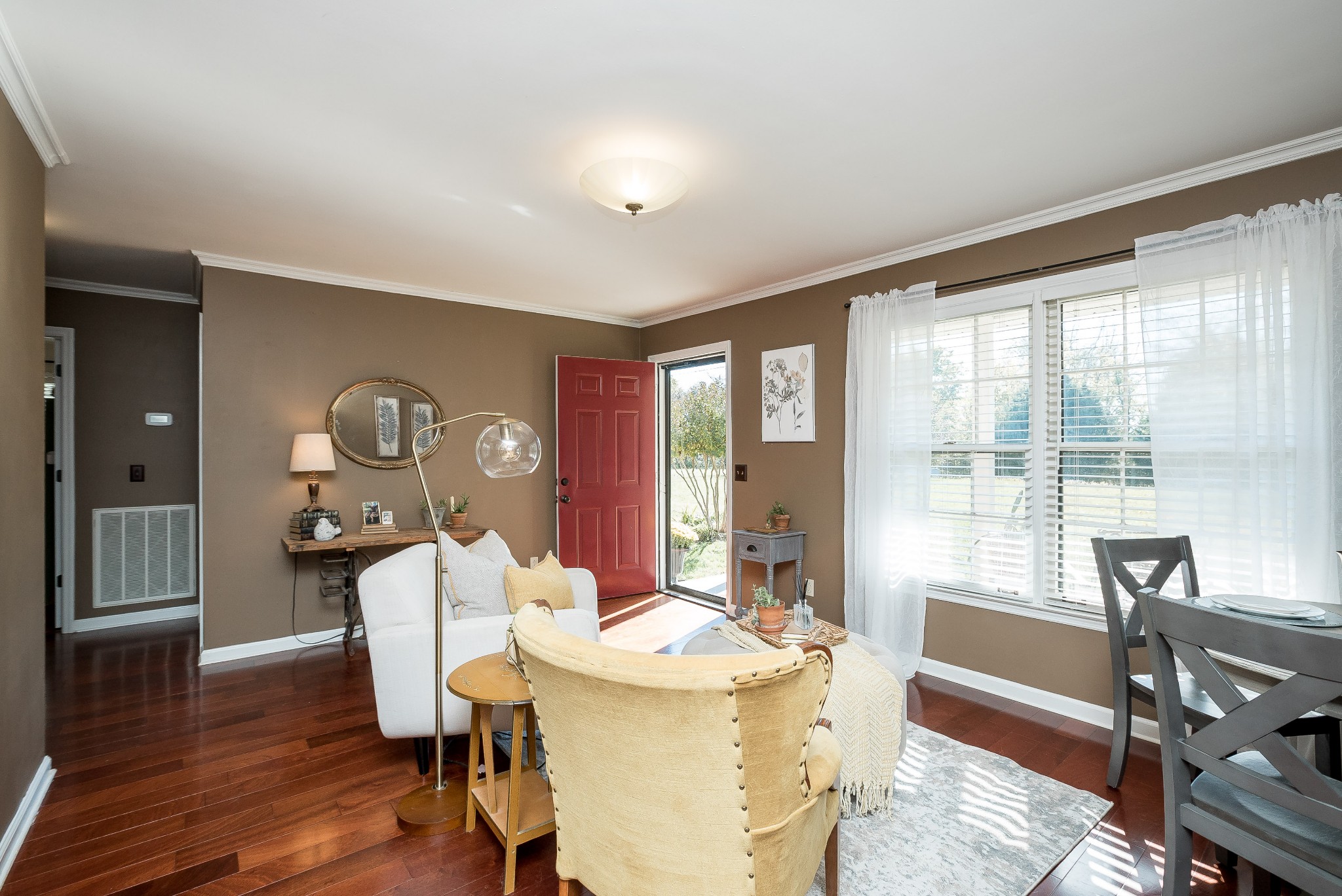 1715 South Walker Road Pleasant View, TN 37146 - Photo 5 of 42 a view of a dining room with furniture window and wooden floor