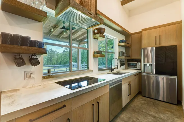 a bedroom with bed and a window