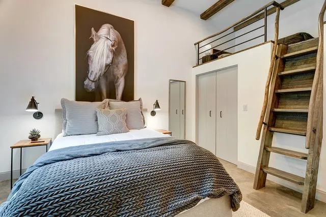 a living room with furniture and a couch