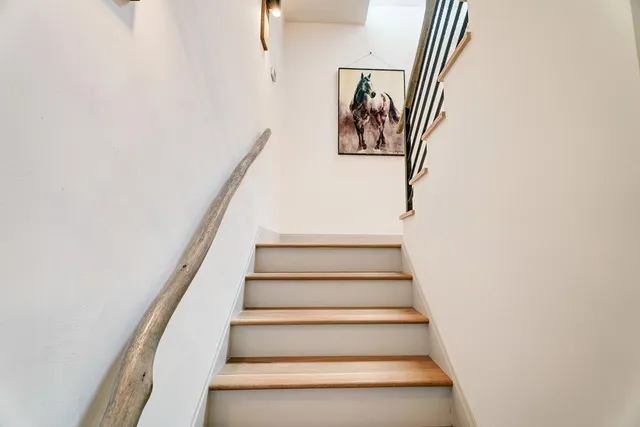 a view of a park with swings and slides