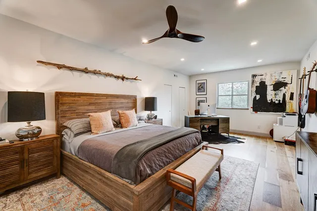 a view of backyard with swimming pool and outdoor seating