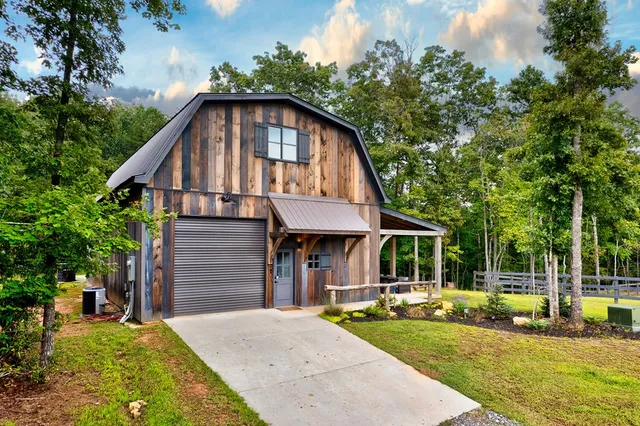 a view of a house with swimming pool