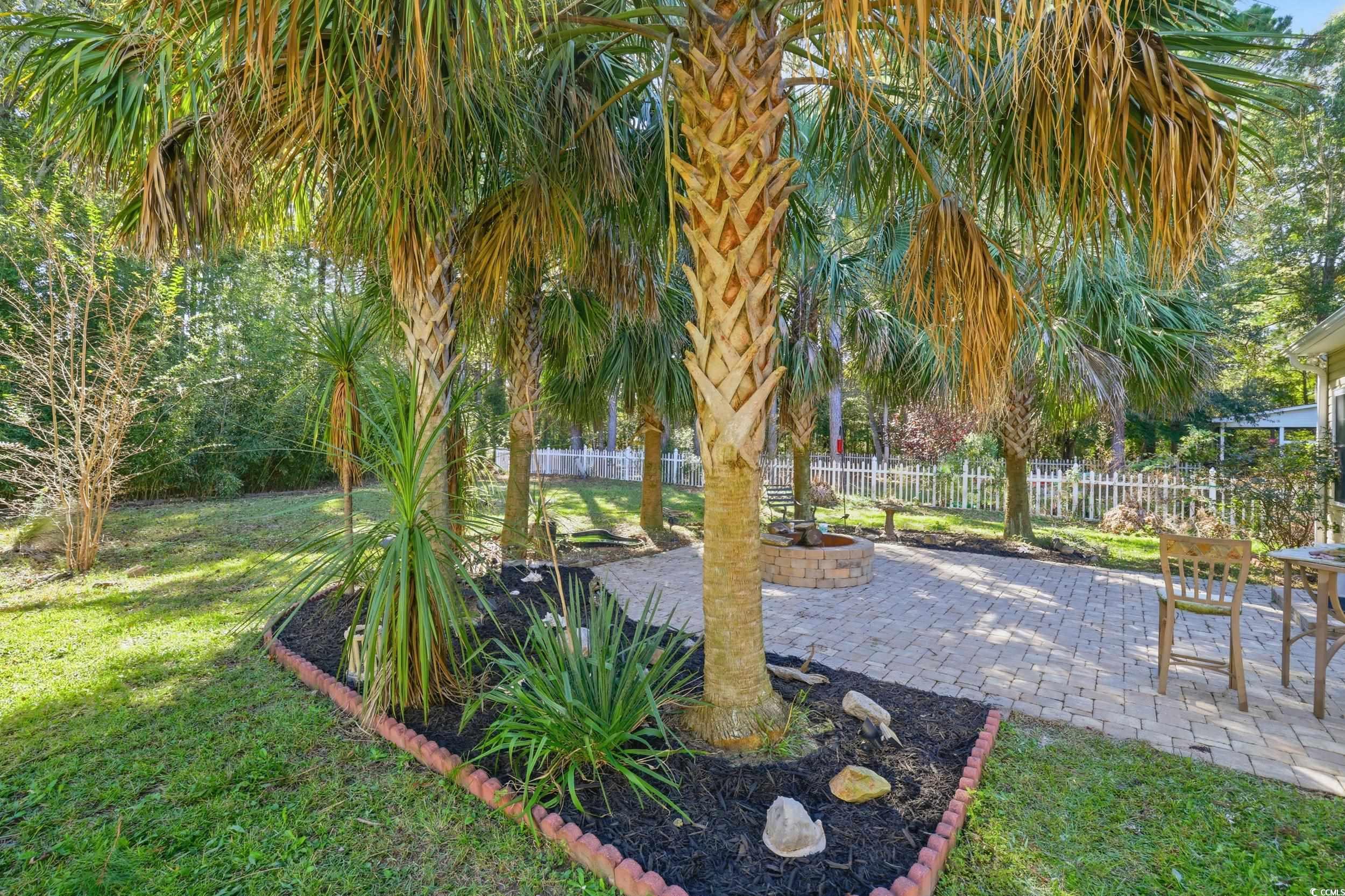 309 Meadowside Drive Little River, SC 29566 - Photo 33 of 40 View of yard featuring a patio area