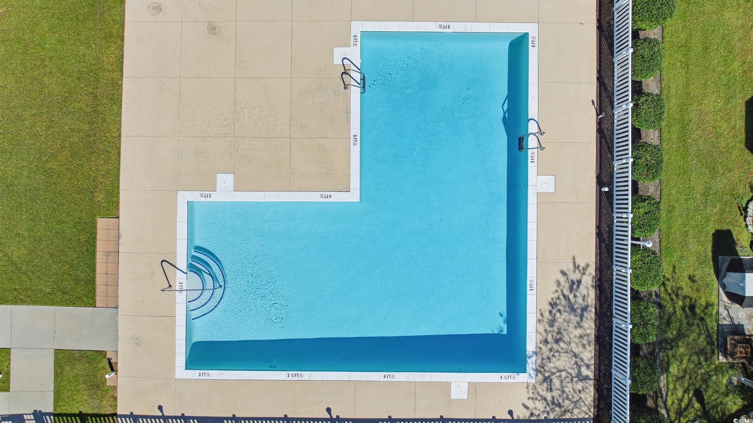 309 Meadowside Drive Little River, SC 29566 - Photo 37 of 40 Drone / aerial view of a pool area