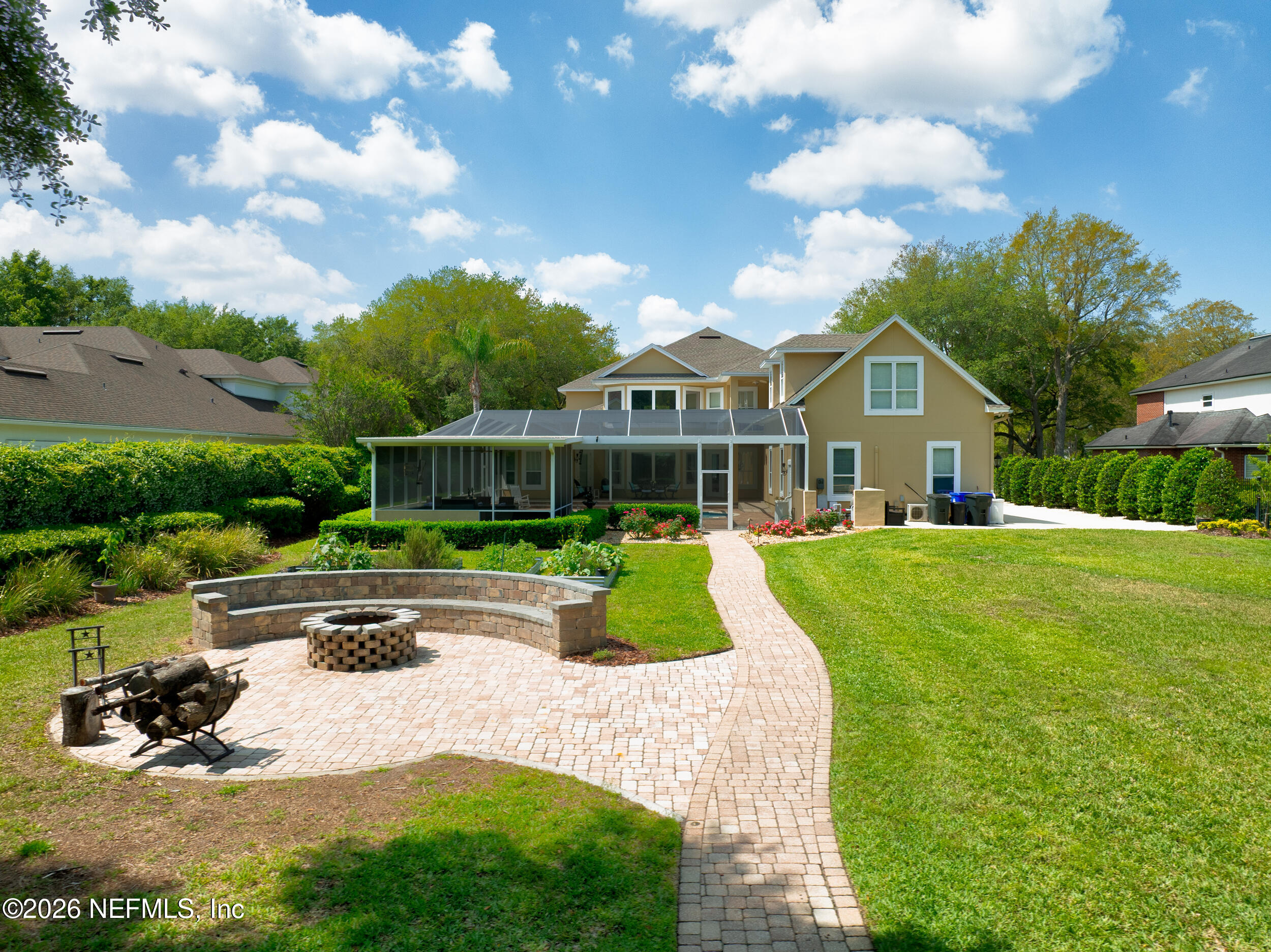 3225 Bishop Estates Road St. Johns, FL 32259 - Photo 74 of 90 a front view of a house with garden