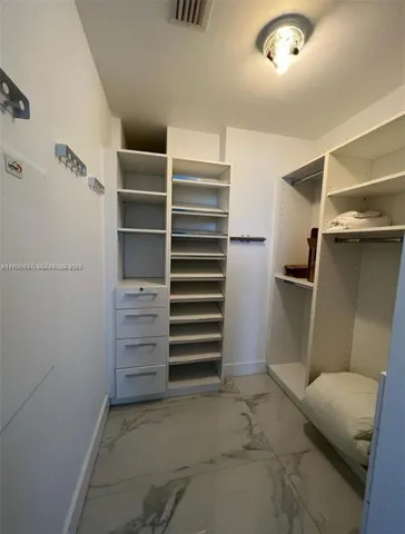 a view of livingroom with furniture and fireplace