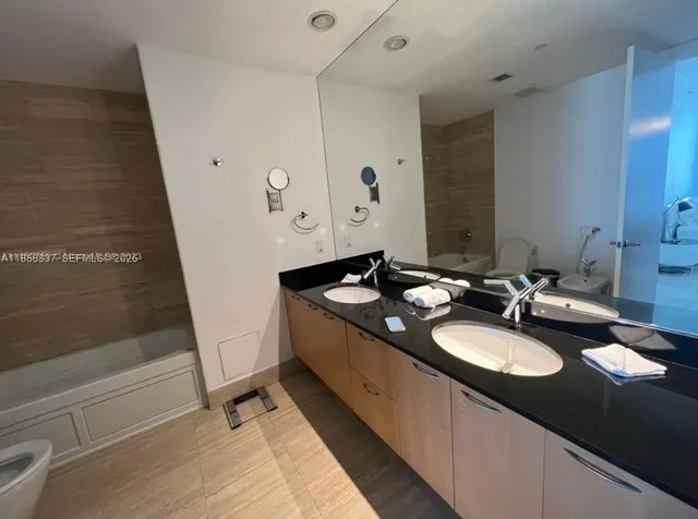 a view of a city with ocean view