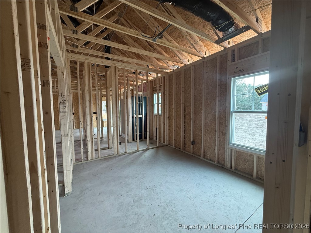 1515 McBryde Lake Road Raeford, NC 28376 - Photo 11 of 14 a view of an empty room with a window