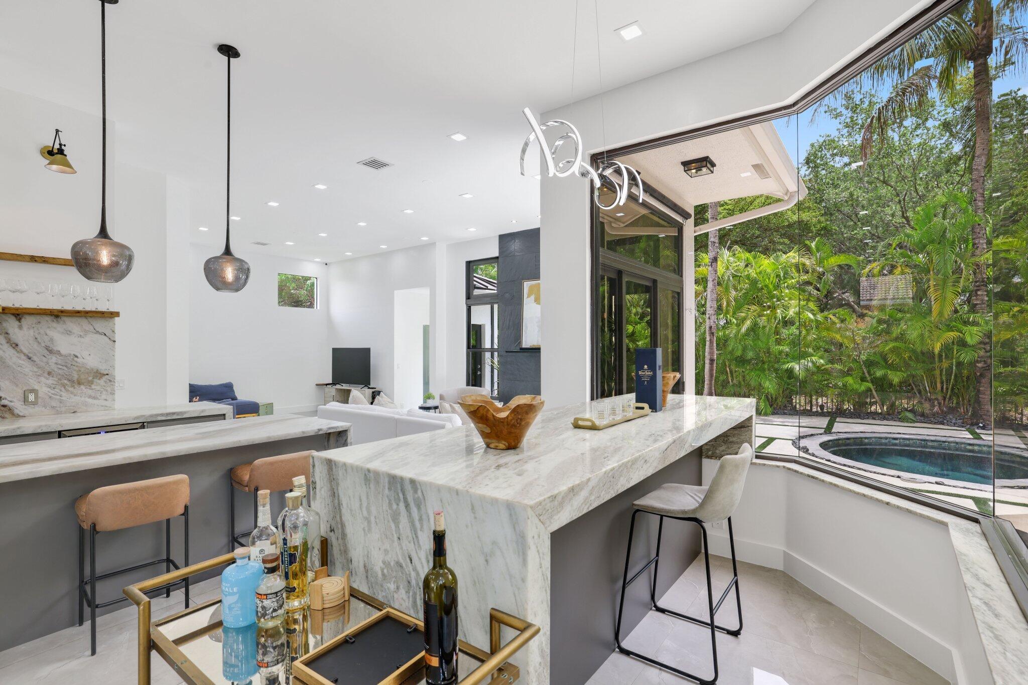 4265 Southwest 185th Avenue Miramar, FL 33029 - Photo 24 of 64 a kitchen with stainless steel appliances granite countertop counter space and a sink