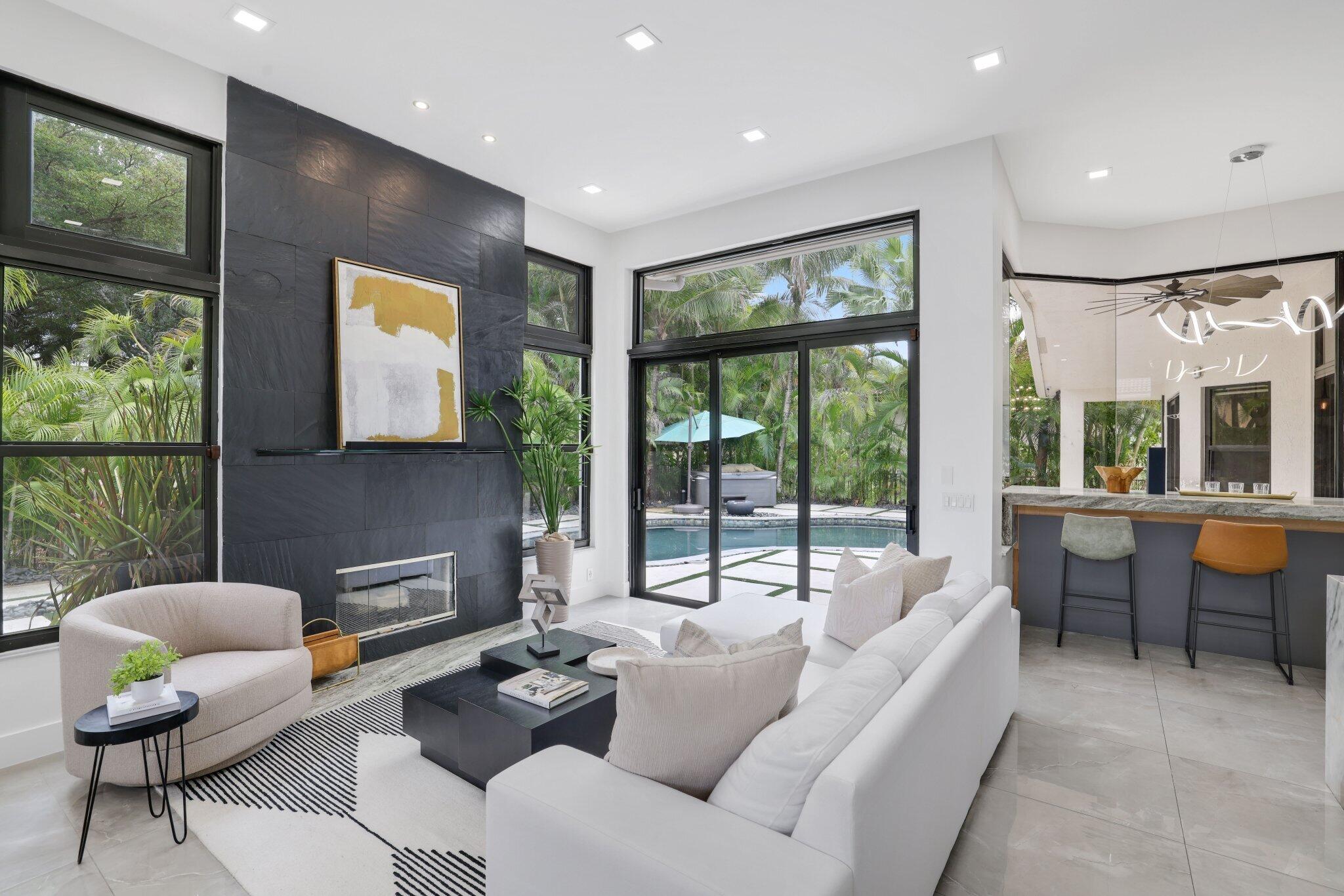 4265 Southwest 185th Avenue Miramar, FL 33029 - Photo 27 of 64 a living room with furniture and a large window