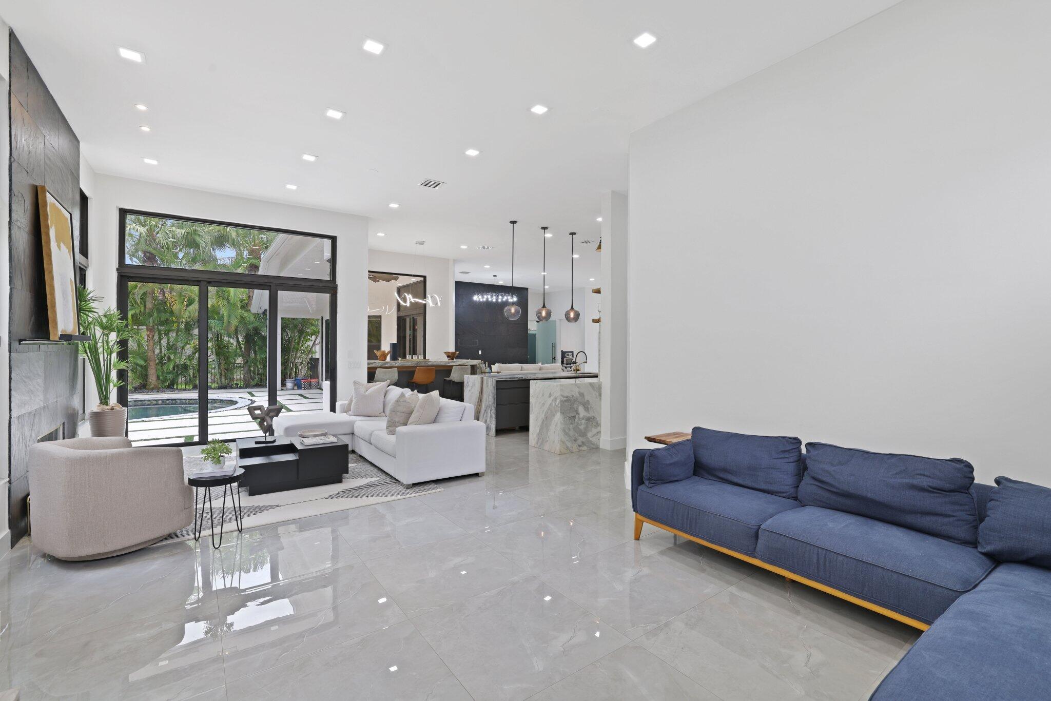 4265 Southwest 185th Avenue Miramar, FL 33029 - Photo 32 of 64 a living room with furniture and a large window