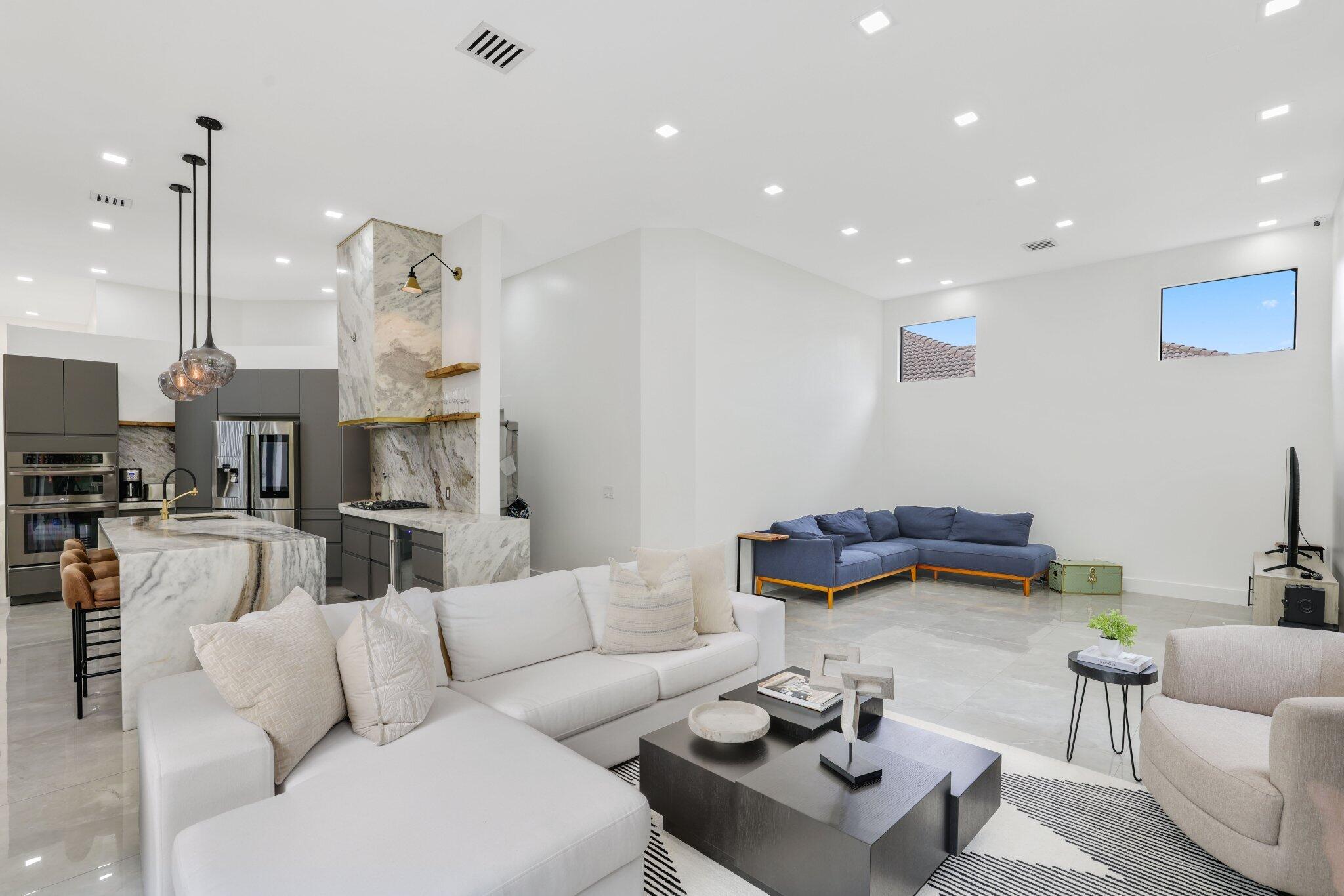 4265 Southwest 185th Avenue Miramar, FL 33029 - Photo 33 of 64 a living room with furniture and kitchen view