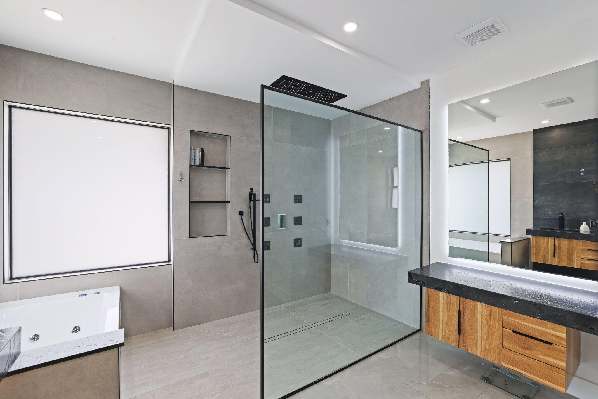 4265 Southwest 185th Avenue Miramar, FL 33029 - Photo 41 of 64 a bathroom with a double vanity sink and mirror