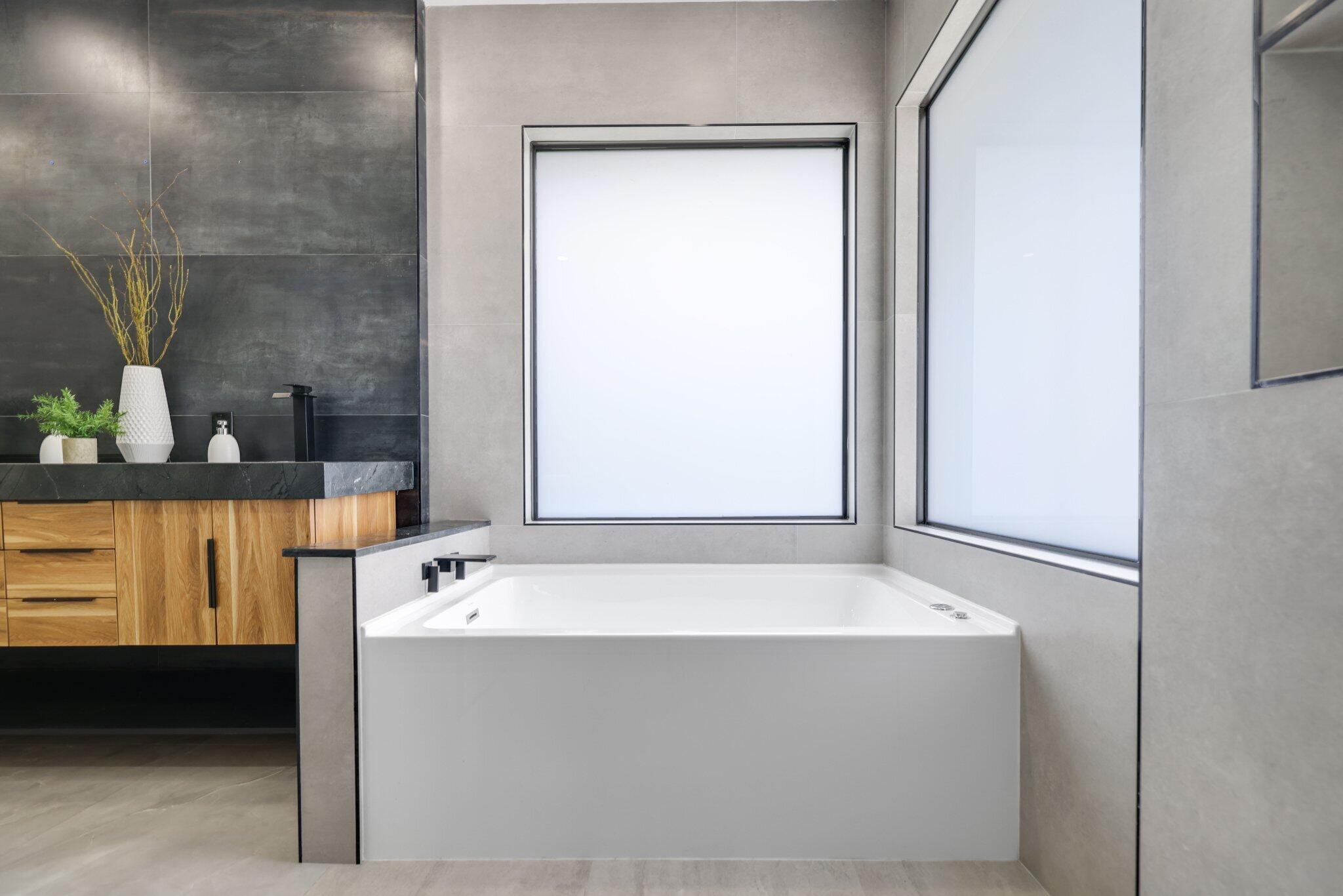 4265 Southwest 185th Avenue Miramar, FL 33029 - Photo 42 of 64 a bathroom with a bathtub and a sink