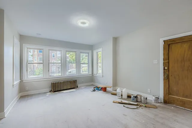 an empty room with windows