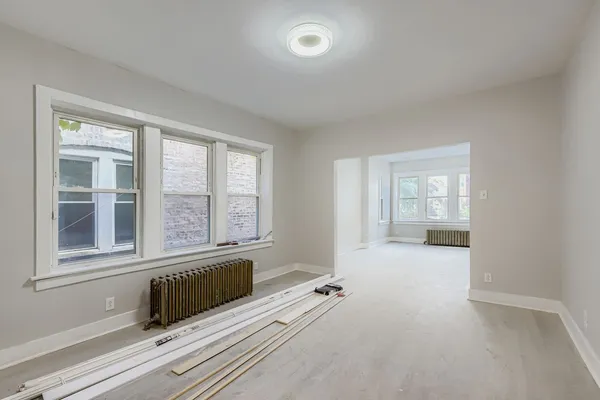 wooden floor and window in a room