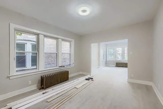wooden floor and window in a room
