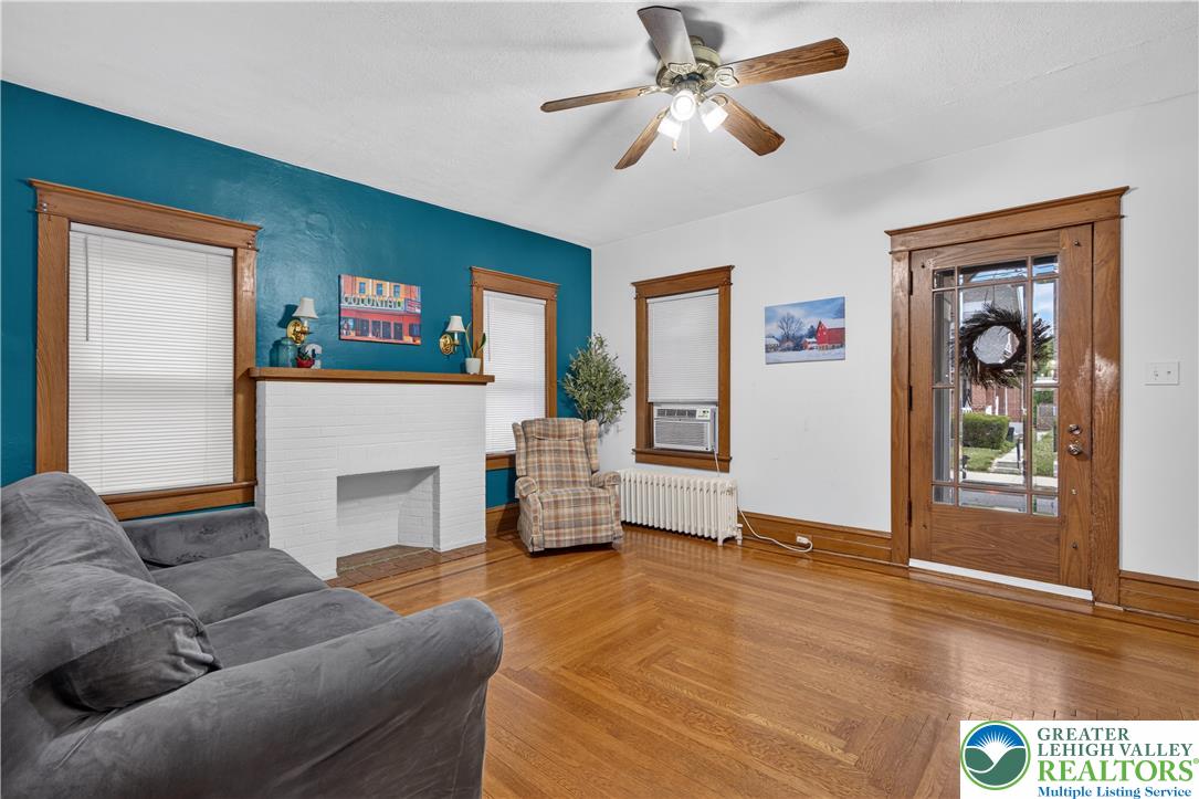 534 Ridge Street Emmaus, PA 18049 - Photo 7 of 40 a living room with furniture and a fireplace
