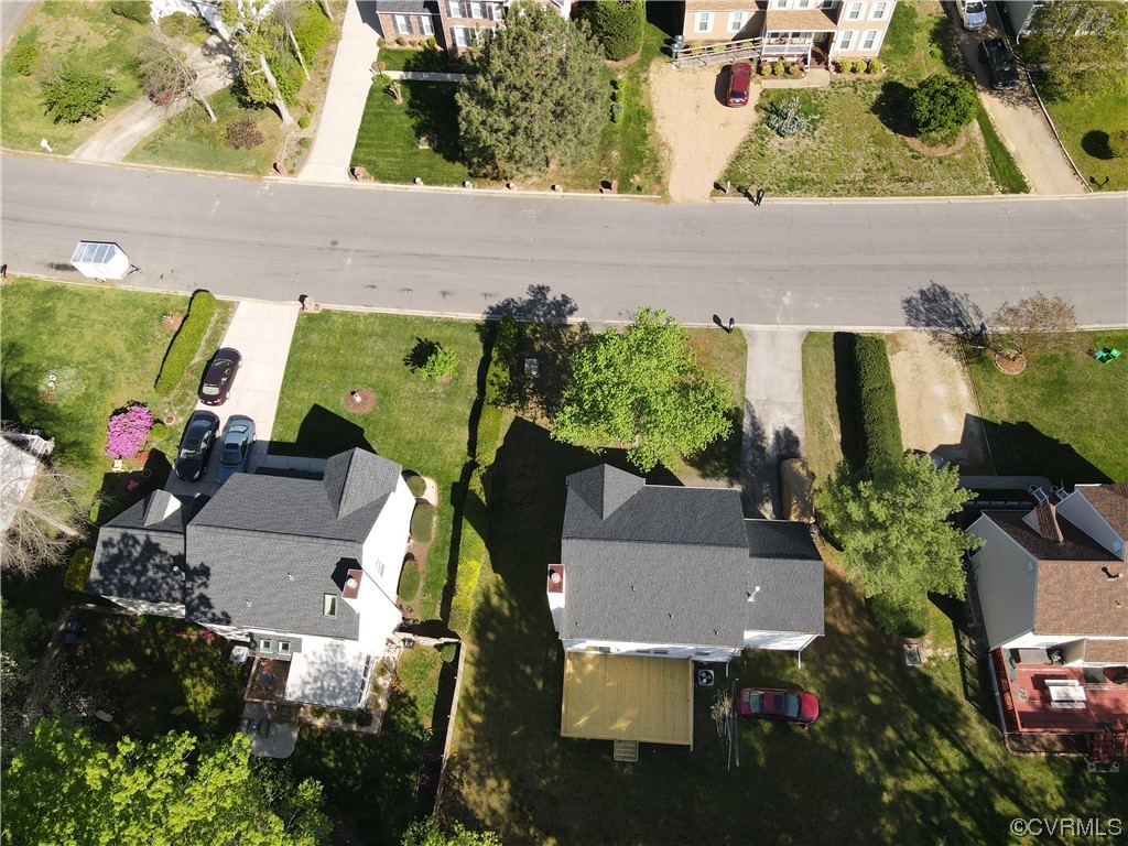 1308 Tree Ridge Road Henrico, VA 23231 - Photo 8 of 23 an aerial view of a house with a yard and lake view