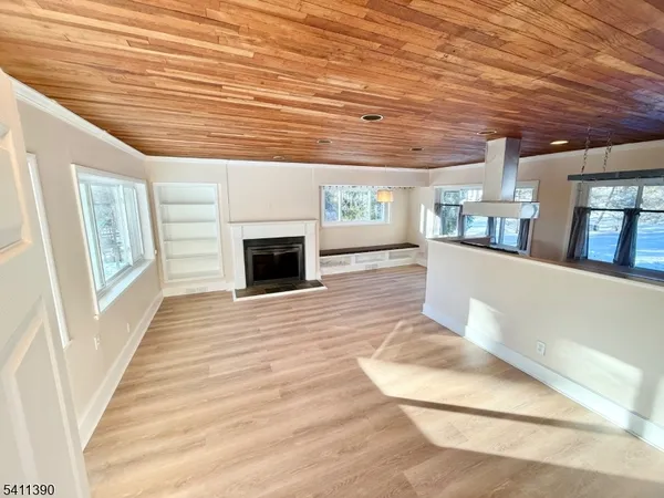 a view of livingroom with furniture wooden floor and window