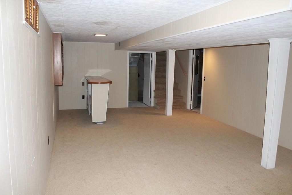 154 Carnavon Circle Springfield, MA 01109 - Photo 16 of 17 a view of an empty room with a window