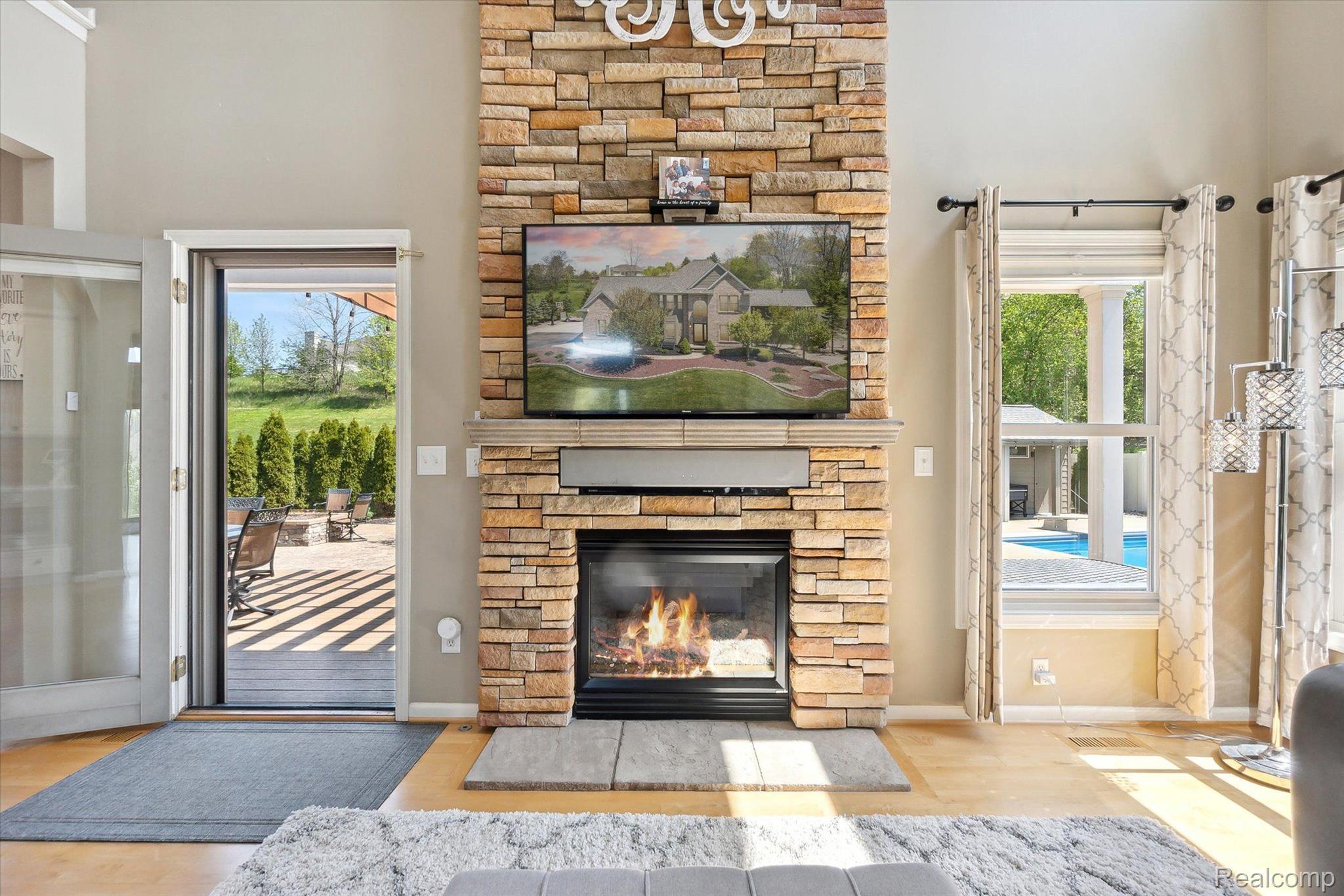 218 Locust Point Howell, MI 48843 - Photo 9 of 59 Stacked Stone Fireplace in Great Room