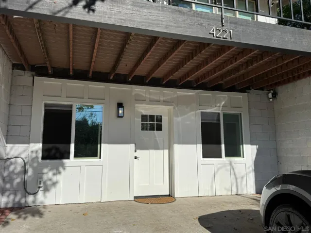 a view of entryway with a front door