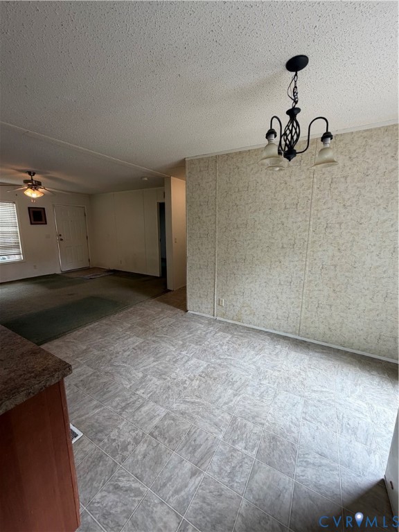 1292 Mt Prospect Road Laneview, VA 22504 - Photo 6 of 25 a view of a livingroom with a dishwasher and a stove