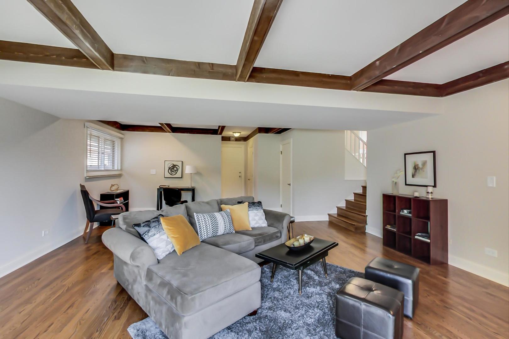 1136 North Greenwood Avenue Park Ridge, IL 60068 - Photo 11 of 30 a living room with furniture and a wooden floor