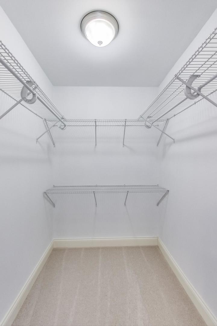 1136 North Greenwood Avenue Park Ridge, IL 60068 - Photo 14 of 30 a view of a room with racks on the wall