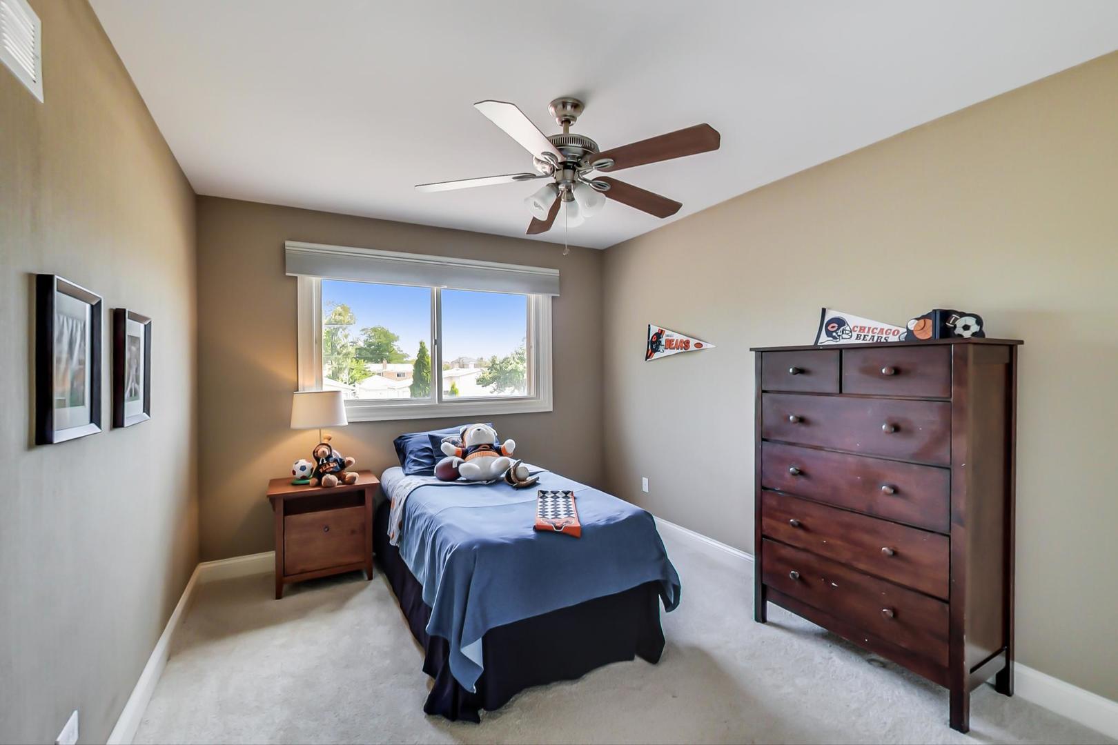 1136 North Greenwood Avenue Park Ridge, IL 60068 - Photo 17 of 30 a bedroom with a bed and a window