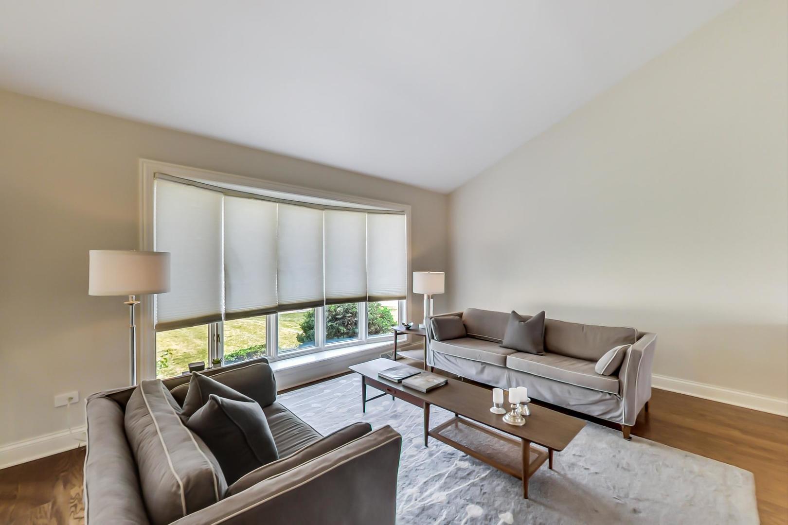 1136 North Greenwood Avenue Park Ridge, IL 60068 - Photo 3 of 30 a living room with furniture and a window
