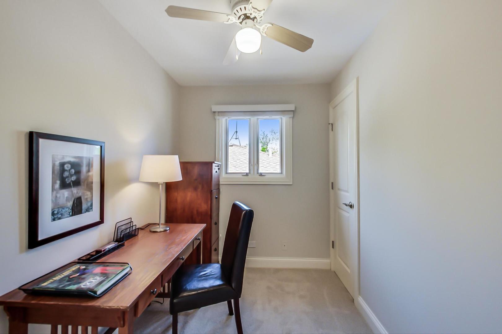 1136 North Greenwood Avenue Park Ridge, IL 60068 - Photo 21 of 30 a view of a dining room with furniture and a chandelier