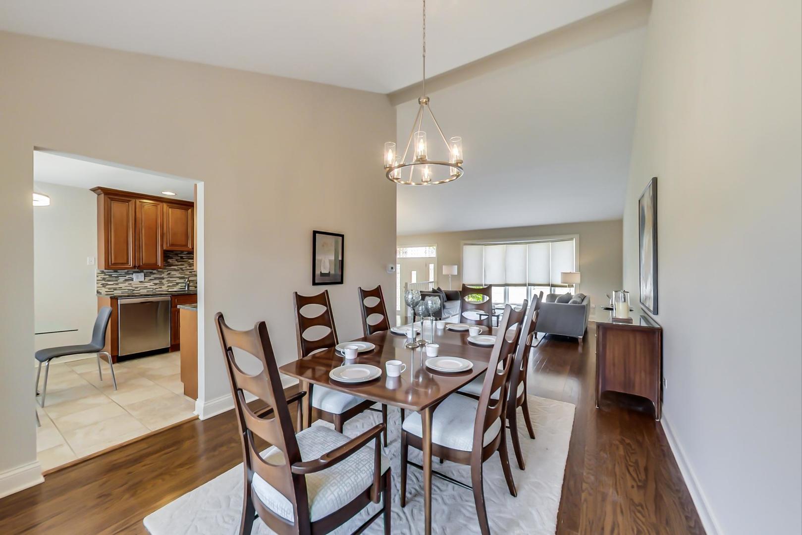 1136 North Greenwood Avenue Park Ridge, IL 60068 - Photo 6 of 30 a view of a dining room with furniture and wooden floor