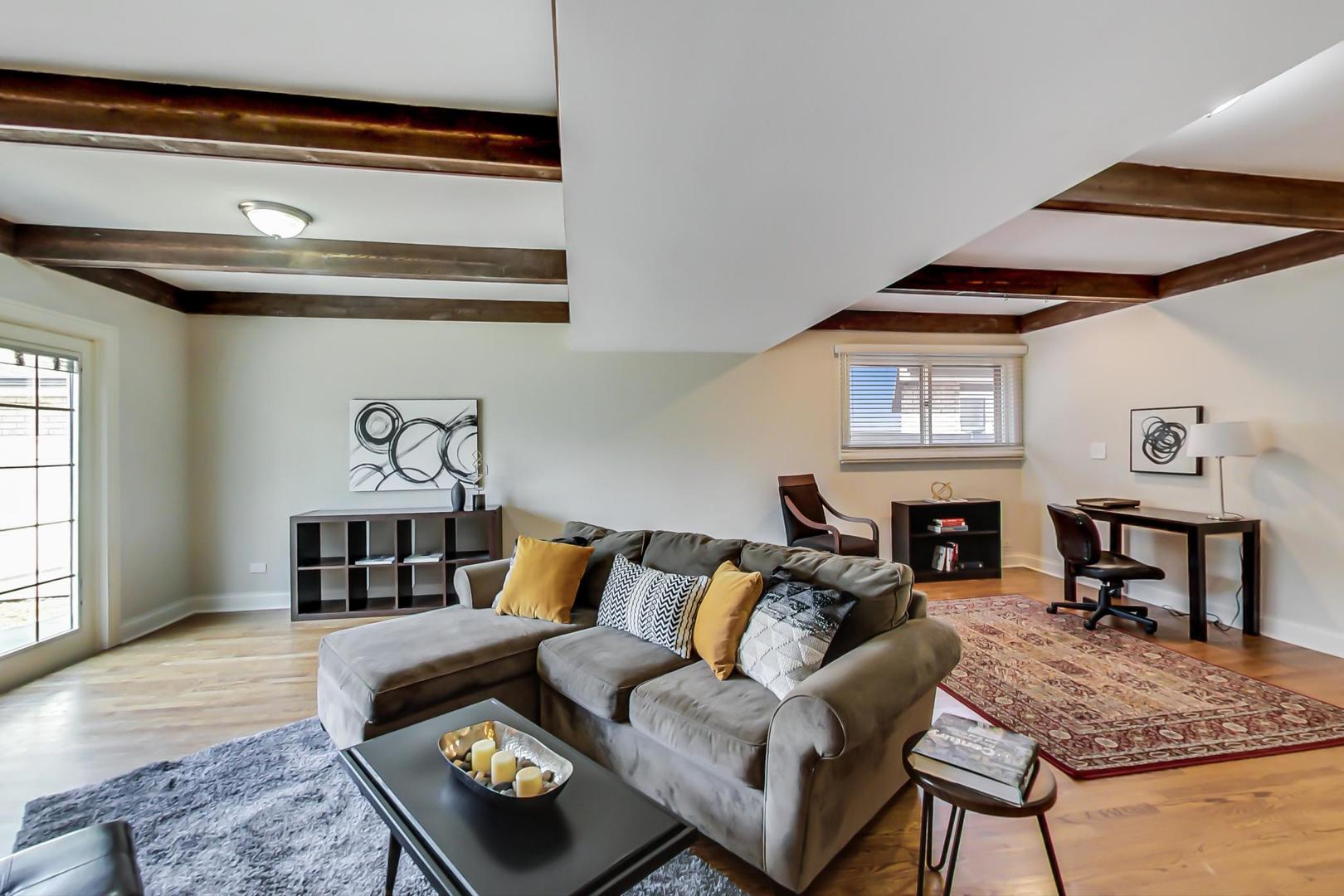 1136 North Greenwood Avenue Park Ridge, IL 60068 - Photo 10 of 30 a living room with furniture and a wooden floor