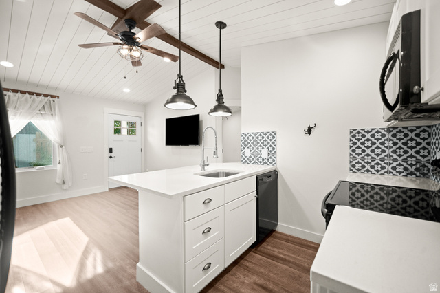 236 West 300 South Hurricane, UT 84737 - Photo 45 of 76 White kitchen island with a built-in sink and pendant lighting