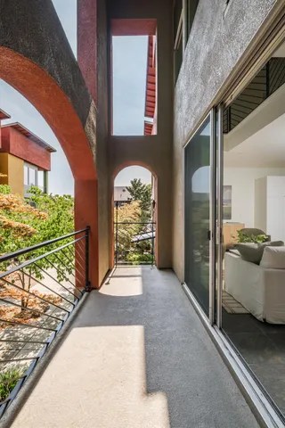 a view of an entryway with a balcony