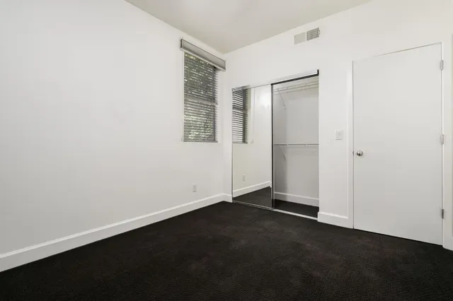 an empty room with a door