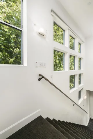 a view of balcony with furniture