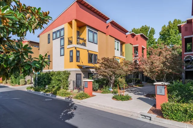 a front view of a house with yard
