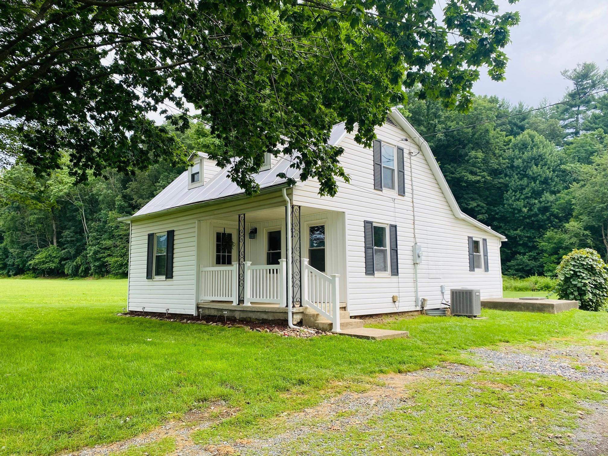 7524 Briery Branch Road Dayton, VA 22821 - Photo 1 of 28 a view of a house with backyard